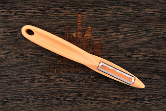 Овощечистка Victorinox, модель 7.6075, рукоять нейлон бежевый